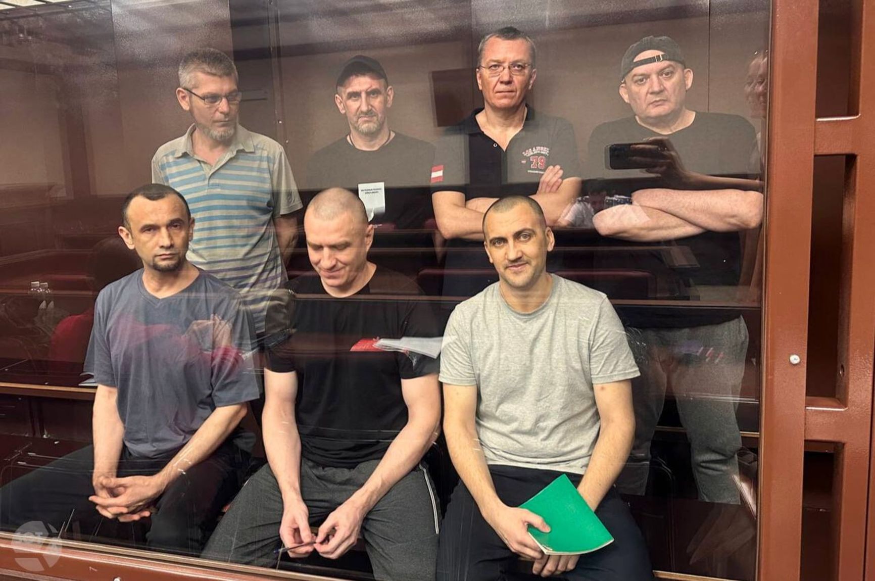 The defendants in the Kherson Nine case in court